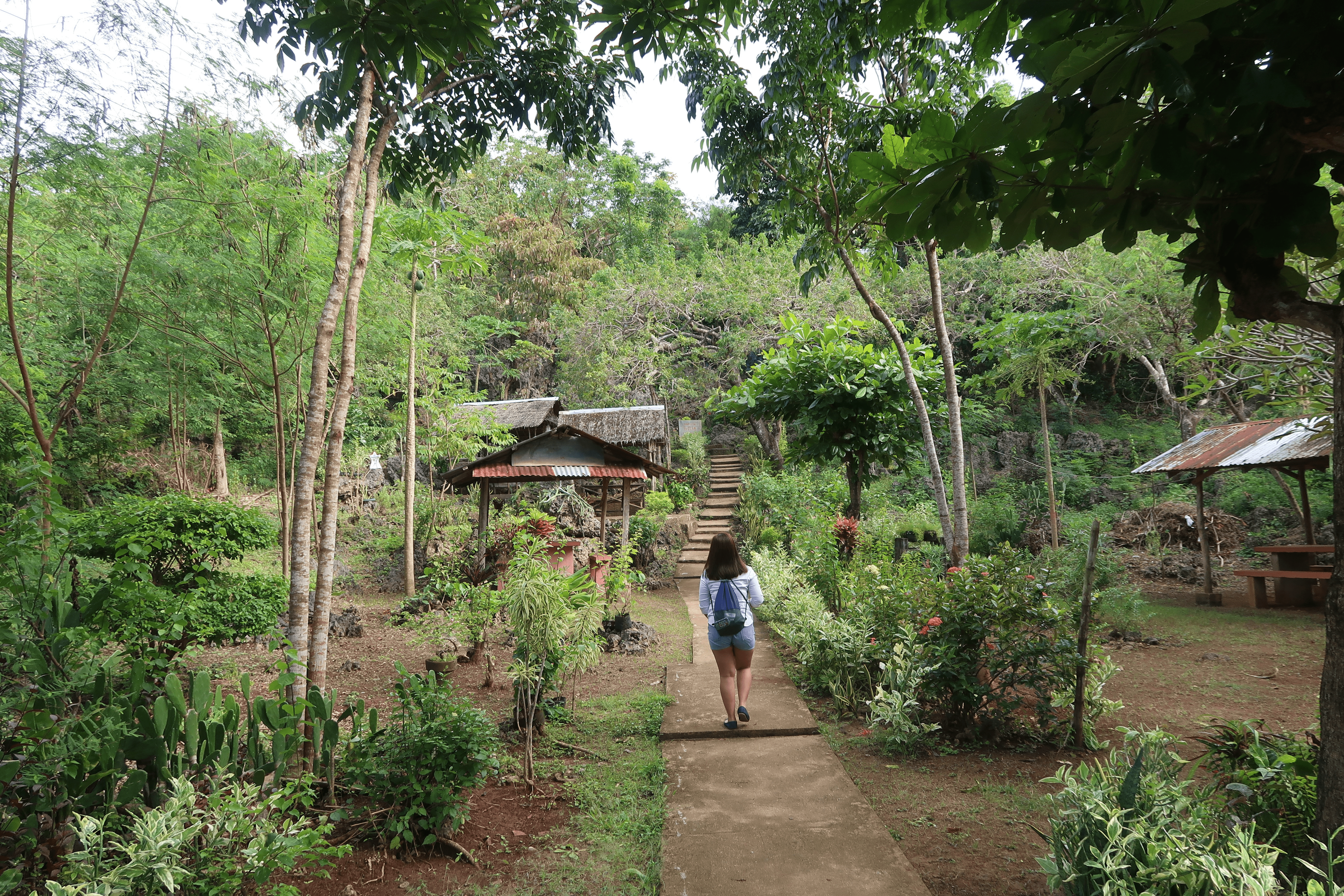 melody somido girl walking in wonderful cave park in bolinao pangasinan province philippines